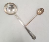 20th century silver-coloured metal ladle with silver marks POP(?) and cross 10c, 32cm long approx.