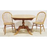 Modern Ercol elm-topped extending dining table and four elm-seated Ercol chairs (5)