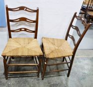 Pair of early 20th century ladderback chairs with rush seats, on turned stretchers and supports (2)