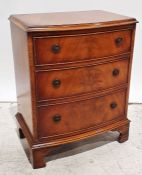 20th century mahogany bowfront chest of three drawers, on bracket feet, 55cm x 70cm