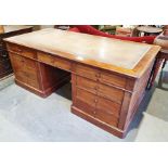 19th century mahogany partner's desk, the rectangular top with rounded corners, moulded edge and
