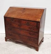 19th century oak bureau, the fall front with fitted interior, two short above three long graduated