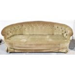 Early Victorian sofa in green dralon upholstery, on turned and gilt front legs to white china