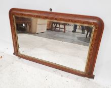 Late 19th century mirror in walnut and parquetry inlaid frame, 84cm x 53cm