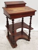 19th century desk with inlaid decoration, turned supports between the shaped tiers, on turned feet