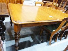 Large 20th century extending dining table, the rectangular top with rounded corners, on turned