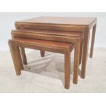 Nest of three teak Gordon Russell rectangular coffee tables on square section supports