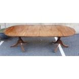 Mahogany Regency-style dining table on twin-pedestal supports Approx. Dimensions: Length 245cm x