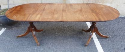 Mahogany Regency-style dining table on twin-pedestal supports Approx. Dimensions: Length 245cm x