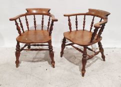 Pair elm-seated captain-type chairs with spindle backs, turned front legs to turned stretchers (2)