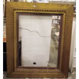 Gilt painted wood picture frame with stylised flowerhead and ropetwist decoration, 111cm x 91cm