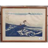 Japanese woodblock colour print depicting fishermen with Mount Fuji in the background together