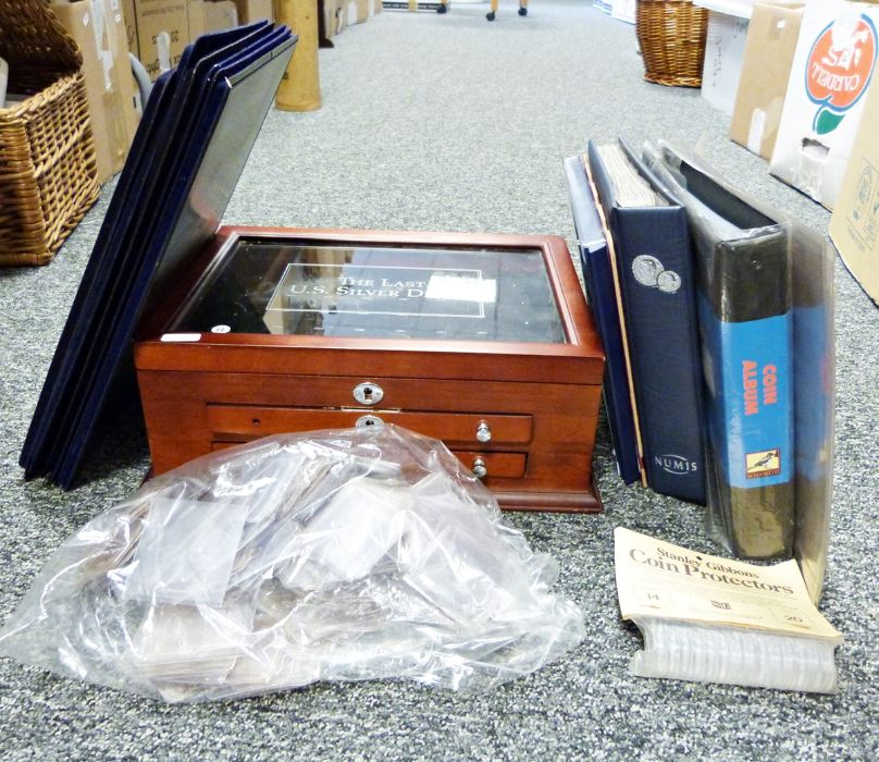 Collection of empty coin albums and two World Coins catalogues