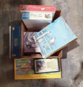 Collection of board games and jigsaws to include Trivial Pursuit and a Silver Crest Ultrasonic
