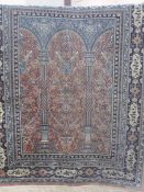 Eastern Silk Rug with columns and arches to the centre in blue and pink, approx 170cm x 125cm