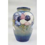 Moorcroft pottery vase, baluster form, light blue ground, anemone pattern, marked to base, with