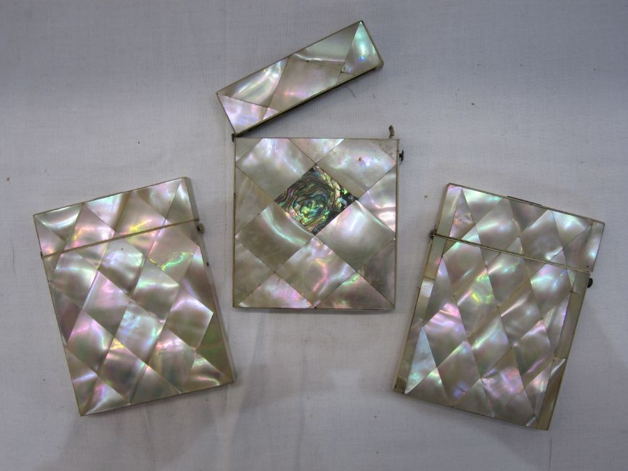 Three mother-of-pearl card cases, one with abalone shell inlay (3)