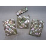 Three mother-of-pearl card cases, one with abalone shell inlay (3)