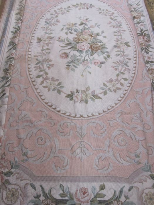 Large modern machine needlepoint carpet/rug, mainly pinks, pale blues, patterned with roses,