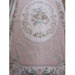 Large modern machine needlepoint carpet/rug, mainly pinks, pale blues, patterned with roses,