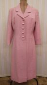 Hardy Amies, 14 Savile Row, London pink tweed coat with five front button fastenings with hidden