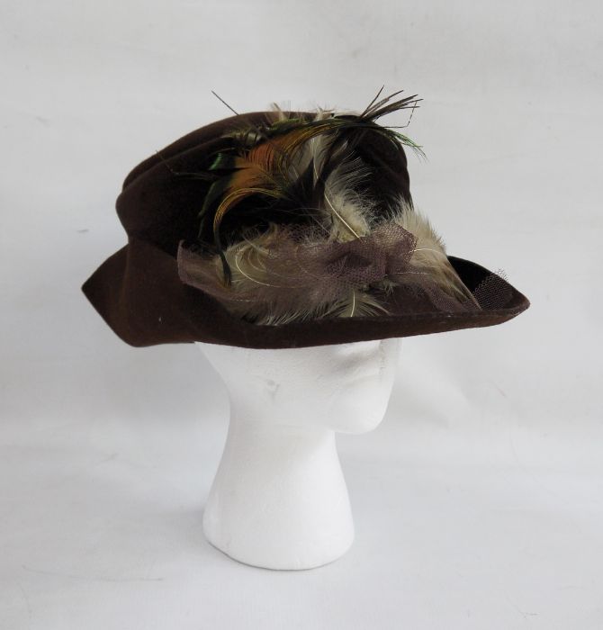 1940's brown felt hat with feathered detail and turned up rim