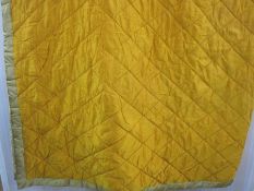 Superking gold-coloured quilted bedspread, a superking green quilted velvet bedcover trimmed with