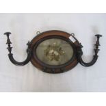 Early 20th century mahogany oval wall hat stand with embroidered oval panel, 28cm wide approx.