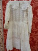 An early 20th century lace and cotton child's dress , with an embroidered cotton christening