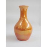 Moorcroft pottery vase with ovoid body and tall neck, orange lustre glaze, impressed mark to base,