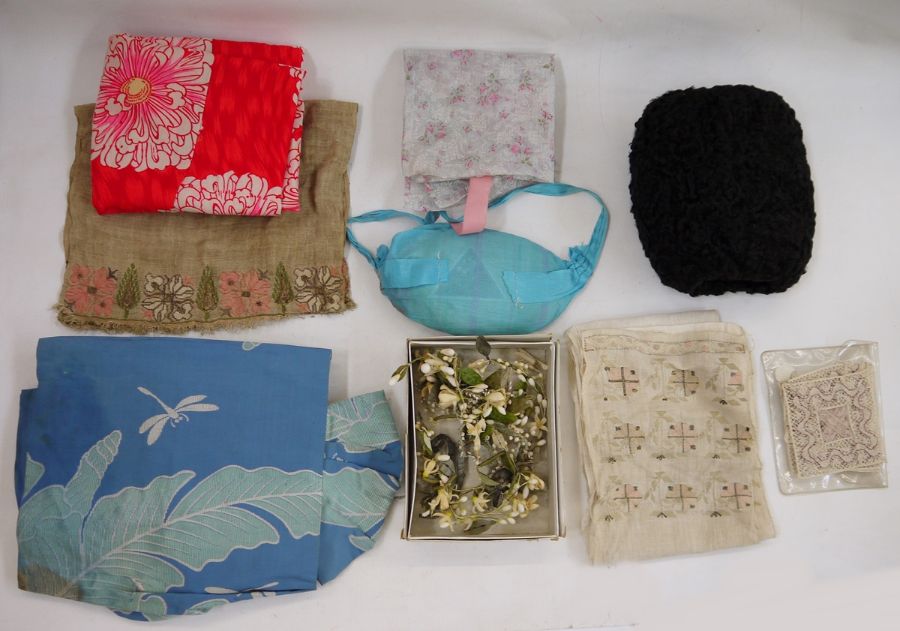 Assorted scarves, a Persian lamb muff, two pieces of embroidered hessian, a pincushion and vintage