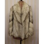 1990's fox fur jacket and a short bolero-type jacket, possibly raccoon, labelled 'Nicolai Furs' (2)