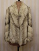 1990's fox fur jacket and a short bolero-type jacket, possibly raccoon, labelled 'Nicolai Furs' (2)