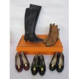 Pair of Hermes black leather boots (size 39), with kitten heel, cream saddle stitching, two