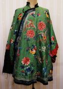 Short Chinese robe embroidered with peonies and butterflies, on a green ground with embroidered