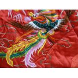 A pair of modern red silk quilts/eiderdowns embroidered with chinese dragons and phoenix , 156 x