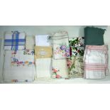 Quantity of assorted embroidered table linen, a piece of dressmaking linen, a remnant of quilted