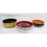 Two Poole pottery Delphis bowls shape number 89, 26.5cm in diameter and 22cm in diameter and a