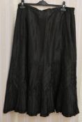 Victorian black satin skirt/petticoat with pleated and hexagonal detail and a Victorian bronze and