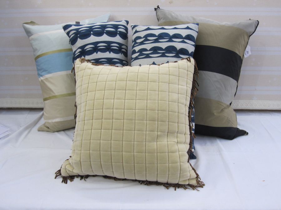 A Designers Guild silk cushion and another silk cushion, a Mulberry quilted velvet cushion trimmed