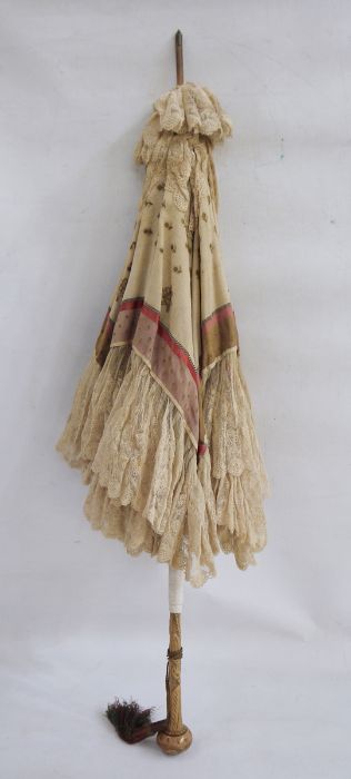 Late Victorian/Edwardian parasol trimmed with lace, printed cotton, with carved wooden handle and