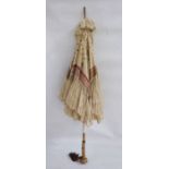 Late Victorian/Edwardian parasol trimmed with lace, printed cotton, with carved wooden handle and