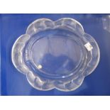 Lalique satin and clear glass oval dish, the six-lobed border embossed with leaping fish, 27cm wide