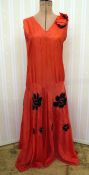 1920's red silk tea dress - drop waist with full skirt, black and red appliqued flowers to the skirt