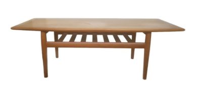 Mid 20th century rectangular teak coffee table with undertier, on tapering supports, 128cm x 54cm