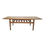 Mid 20th century rectangular teak coffee table with undertier, on tapering supports, 128cm x 54cm