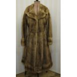 1970's-style mink coat, A-line, with belt and a banded hem