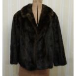 Short mink jacket with shawl collar, bracelet sleeves and mink hat