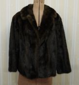 Short mink jacket with shawl collar, bracelet sleeves and mink hat