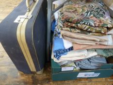 Assorted vintage remnants to include damask, cotton, linen, wool, etc and a vintage suitcase (2)